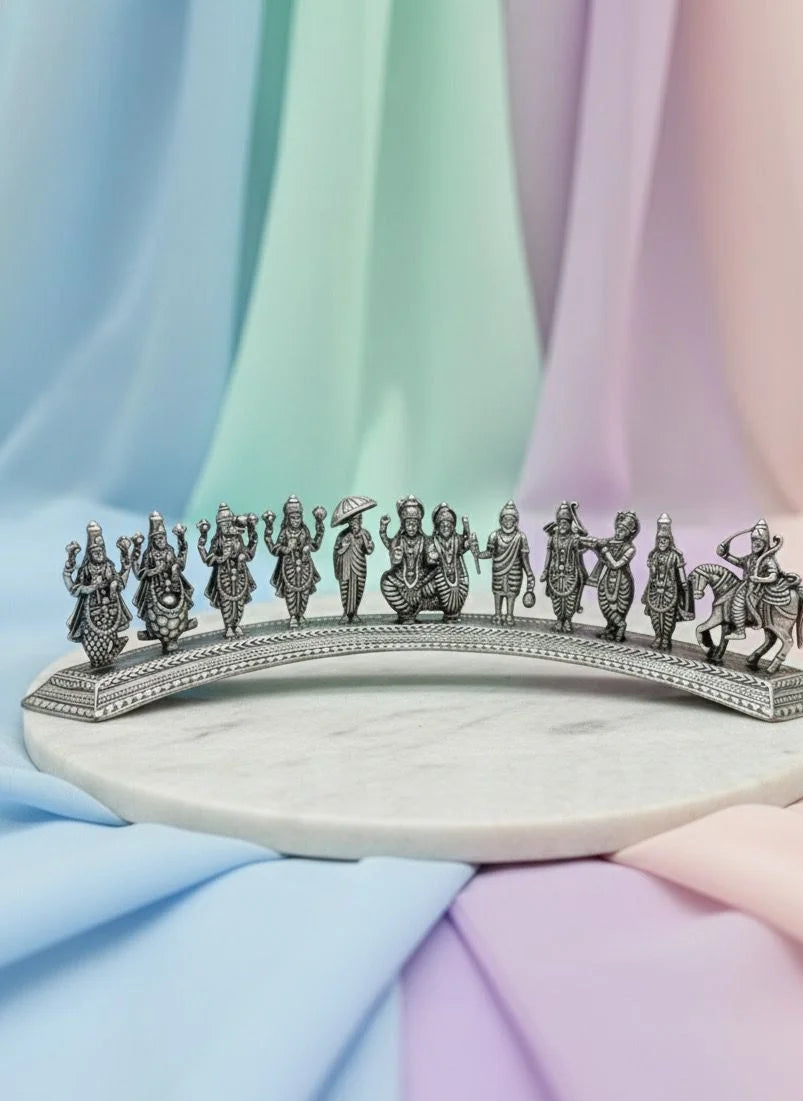 Decorative arch with figurines on a pastel fabric background