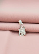Silver lord  pendant on a pink fabric background