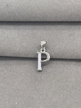 Silver 'P' pendant on a gray fabric background