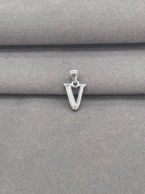 Silver 'V' shaped pendant on a gray fabric background