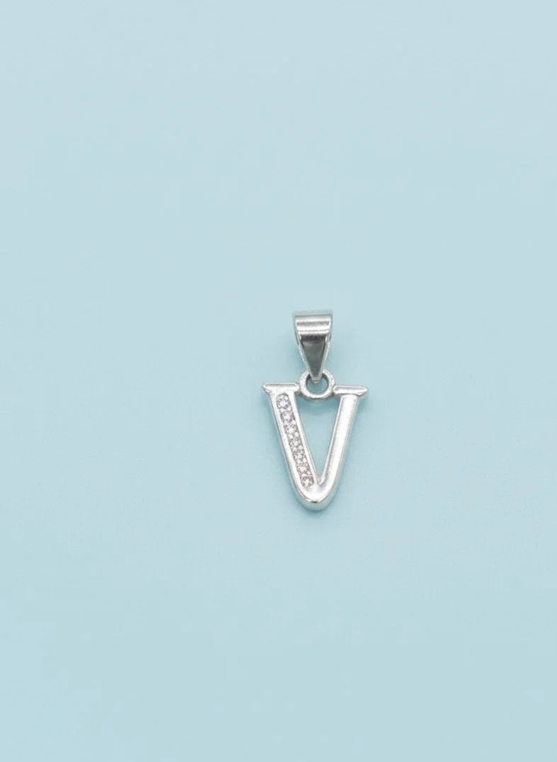 Silver 'V' pendant on a light blue background