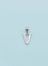 Silver 'V' pendant on a light blue background