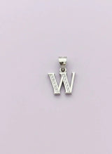 Silver letter 'W' pendant on a light purple background