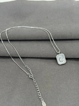 Pure 925 Silver necklace with a pendant on a gray surface