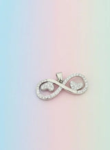 Silver infinity symbol pendant on a pastel gradient background
