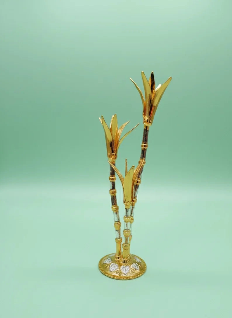 Decorative bamboo sculpture on a light green background