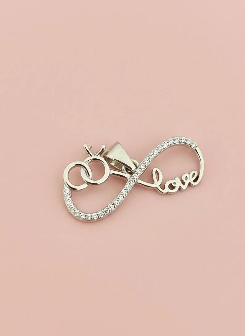 'love' pendant on a pink background