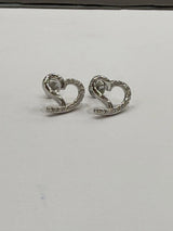 Heart-shaped silver earrings on a white background