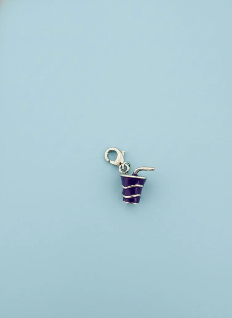 Small striped charm on a light blue background