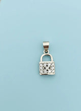 Silver padlock-shaped pendant with diamonds on a light blue background