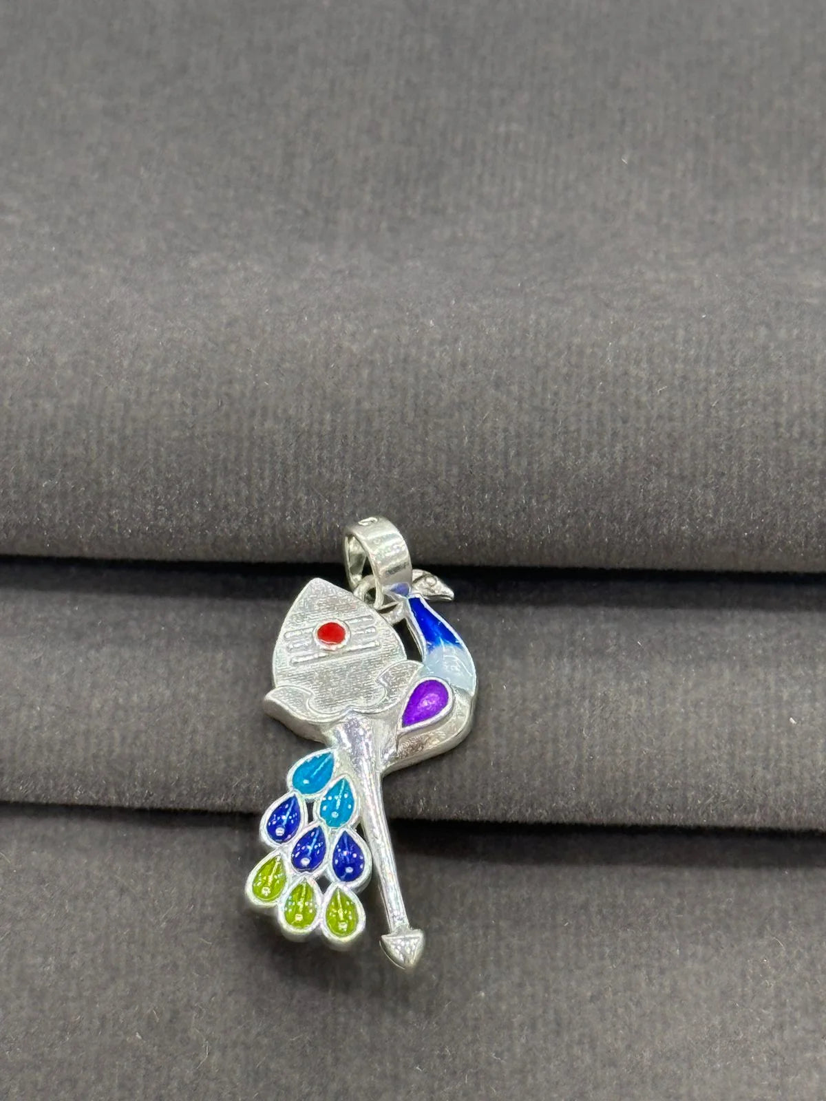 Colorful pendant with a gray background
