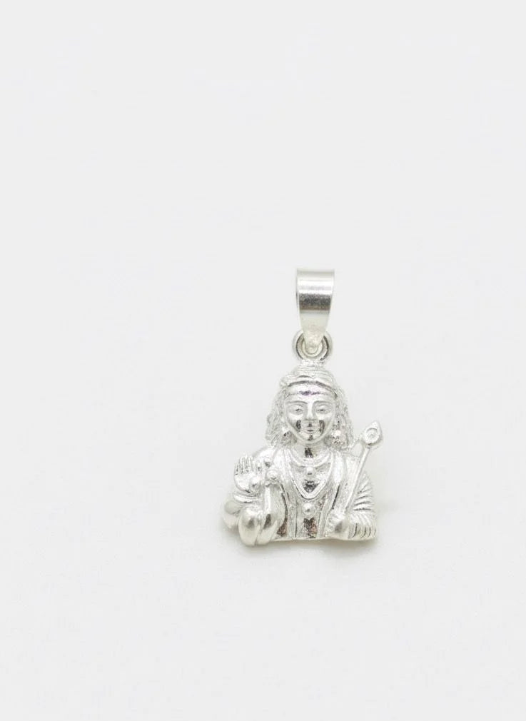Silver pendant with a religious figure on a white background