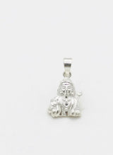 Silver pendant with a religious figure on a white background
