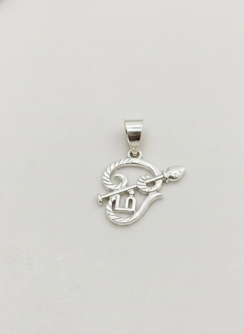 Silver pendant with a design on a white background